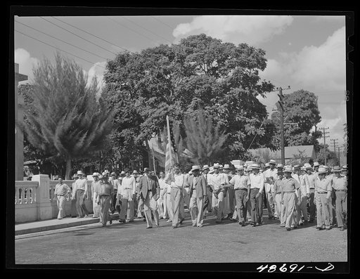 Yabucoa, Puerto Rico (vicinity). Procession of sugar strikers through a small town