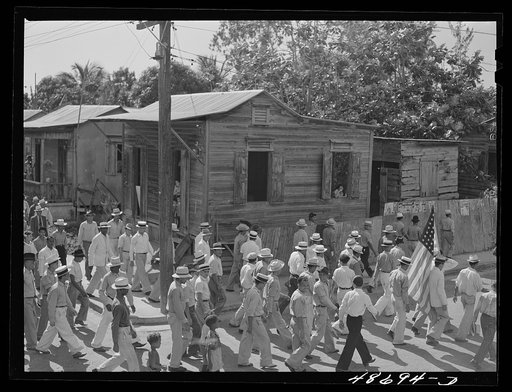 Yabucoa, Puerto Rico (vicinity). Procession of sugar strikers through a small town