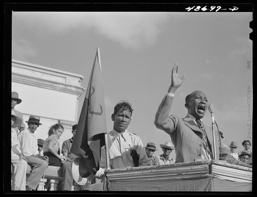 Untitled photo, possibly related to: Yabucoa, Puerto Rico. Union leader speaking to strikers at a meeting in the plaza