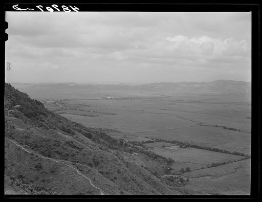 Yabucoa Valley, Puerto Rico. The sugar mill and the surrounding land is all owned by a company in Yabucoa