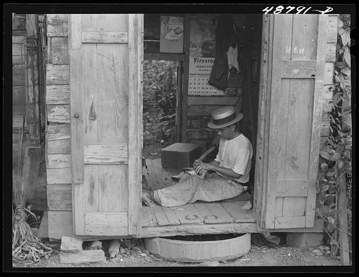 Untitled photo, possibly related to: Bayamon, Puerto Rico. Shoemaker's shop
