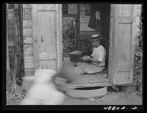Untitled photo, possibly related to: Bayamon, Puerto Rico. Shoemaker's shop