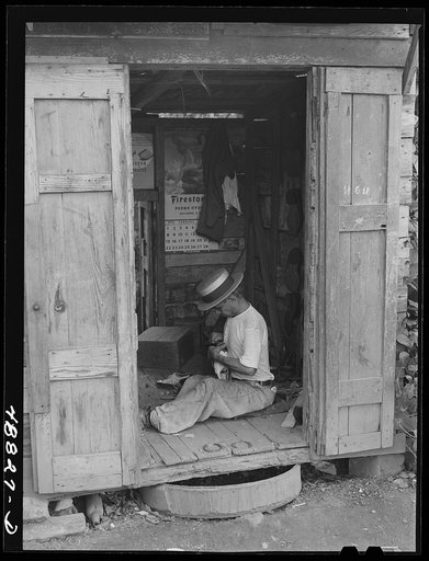 Bayamon, Puerto Rico. Shoemaker's shop