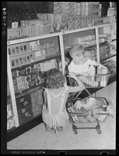 Children buying groceries in co-op store. Greenbelt, Maryland
