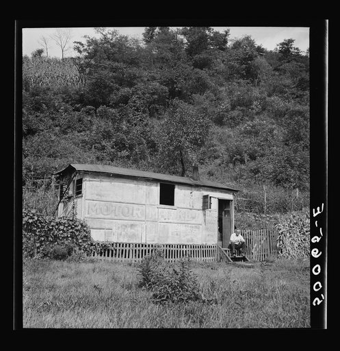 Unemployed miner's home he built. "It'll be purtier when I paint it."  Scott's Run, West Virginia. Osage, West Virginia