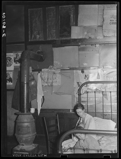 Wife and two children of coal miner. She is sick, has five other children.  Marine, West Virginia