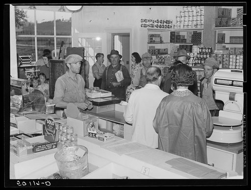Buying groceries in community store. Tygart Valley, West Virginia