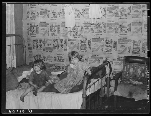 Children in bedroom of their home, Charleston, West Virginia. Their mother has TB. Father works on WPA (Works Progress Administration). See 50129-D
