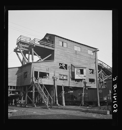 Old rotting coal tipple. Scotts Run, West Virginia