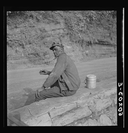 Coal miner waiting for lift home. Capels, West Virginia