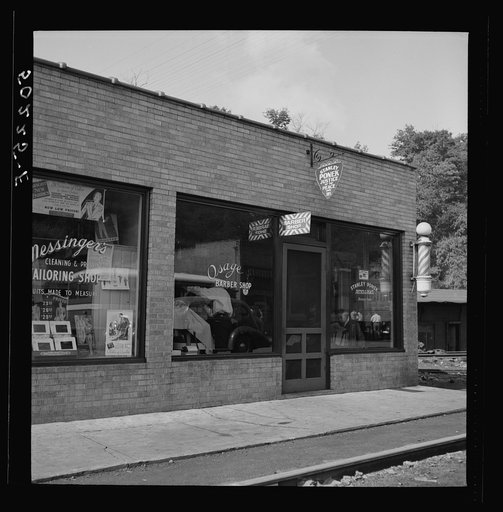 Stores in center of mining town. The barber is also the Justice of Peace.  Osage, West Virginia