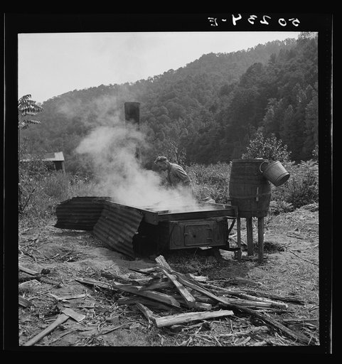 Skimming sorghum molasses. Racine, West Virginia