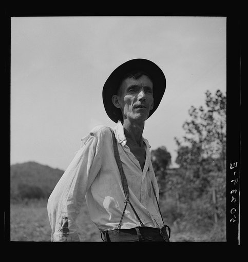 Badly wounded and gassed in world war. Racine, West Virginia. Watching sorghum mill operations