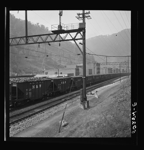 Coal cars going through center of mining town. Davey, West Virginia