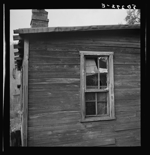 Untitled photo, possibly related to: Boarded-up homes in abandoned mining town. Twin Branch, West Virginia. Once very nice, owned by Ford. About four years ago when an attempt to organize it was made, Ford closed it down completely rather than have it unionized. Around 1000 men used to work there. T