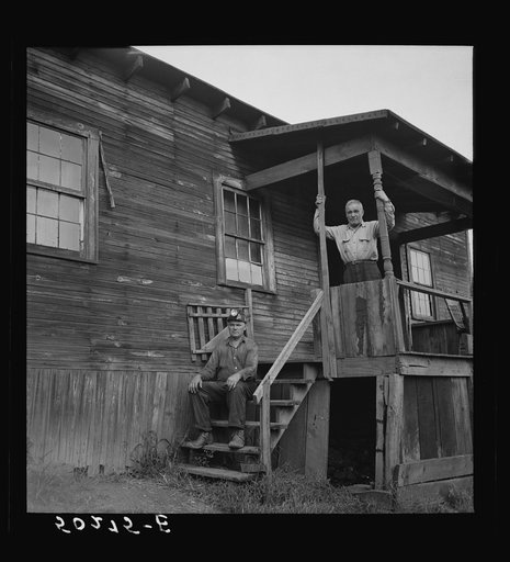 Coal miner ready to go to work. Front of home.  "The Patch," Chaplin, West Virginia