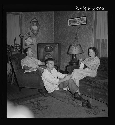 Untitled photo, possibly related to: Miner who has worked in mines since he was fourteen and has tried to save money and have a better home, with his wife, suffering from bad bronchial condition and asthma. Chaplin, West Virginia