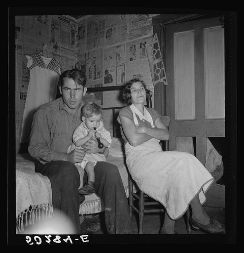Coal miner, his wife and one of their many children. Bertha Hill, West Virginia