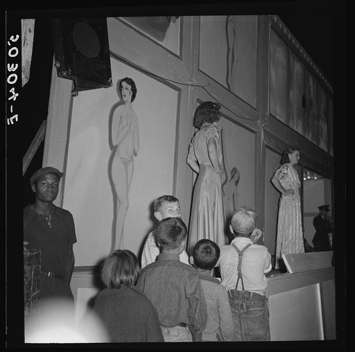 "That's what you wanna see and that's what you will see and don't bring bashful with you 'cause he can't take it." An outdoor carnival comes once a year to the mining section. Granville, West Virginia
