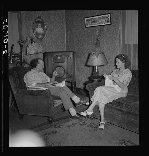 Untitled photo, possibly related to: Miner who has worked in mines since he was fourteen and has tried to save money and have a better home, with his wife, suffering from bad bronchial condition and asthma. Chaplin, West Virginia