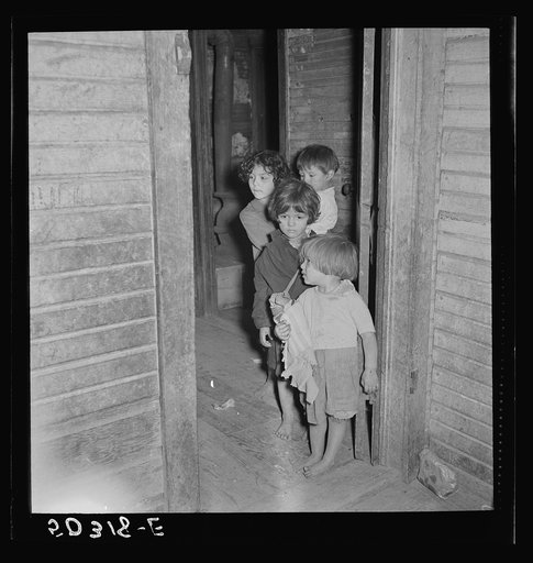 Mexican miner's children in doorway of home. See 50315-E. Bertha Hill, West Virginia