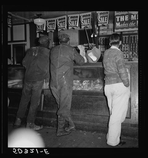 Coal miners buying supplies in company store. Scotts Run, West Virginia