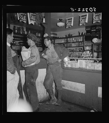 Untitled photo, possibly related to: Coal miners buying supplies in company store. Scotts Run, West Virginia