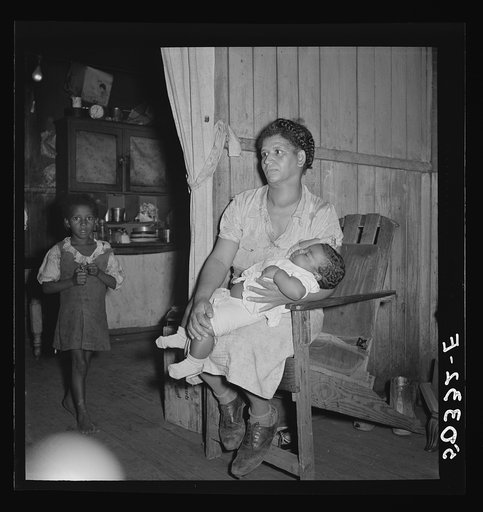 Coal miner's wife (note goiter) and two children. Chaplin, West Virginia