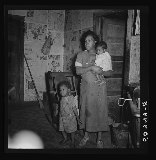 Untitled photo, possibly related to: Coal miner's wife and two of their children. Bertha Hill, West Virginia