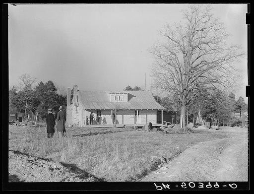 Untitled photo, possibly related to: Negro family (rehabilitation clients) on porch of new home they are building near Raleigh, North Carolina