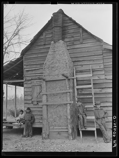 Mud chimney on home of Indian (mixed breed--"brass ankles") family near Summerville, South Carolina