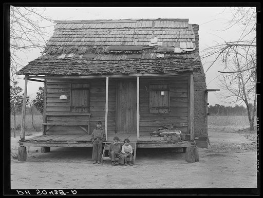 Mud chimney on home of Indian (mixed breed--"brass ankles") family near Summerville, South Carolina