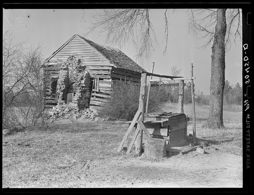 Old well and weaving house on farm purchased for rehabilitation clients near Raleigh, North Carolina