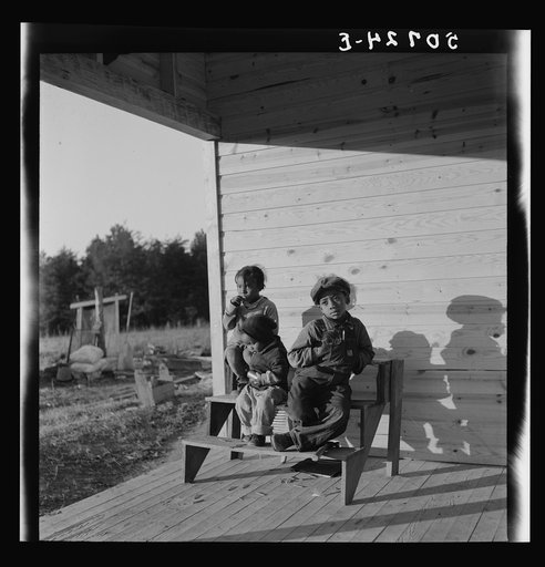 Untitled photo, possibly related to: Family of rehabilitation client on front porch of new home near Raleigh, North Carolina