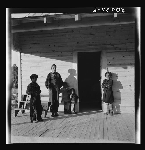 Untitled photo, possibly related to: Family of rehabilitation client on front porch of new home near Raleigh, North Carolina