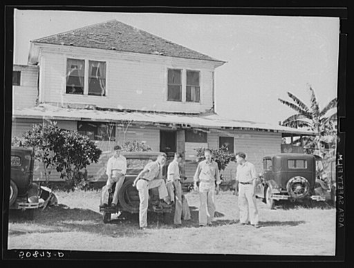 Migrant agricultural workers from Tennessee, Carolina, Alabama, Georgia living in overcrowded boardinghouse and working in packinghouses in Homestead, Florida