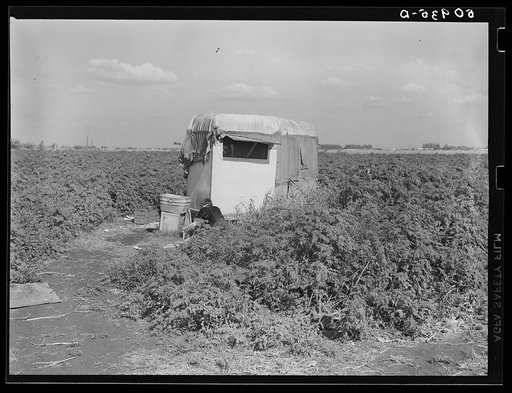 Untitled photo, possibly related to: Migrant packinghouse laborer's homemade trailer home. Belle Glade, Florida. They are from Pennsylvania, have two children. Both parents work