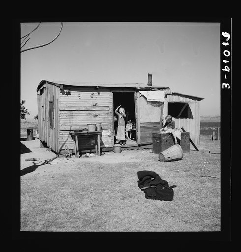 Migrant agricultural laborer's home. From North Carolina. They have six children, near Belle Glade, Florida