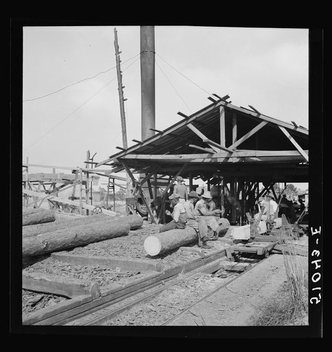 Waiting for motor to cool off.  Sawmill, Childs, Florida