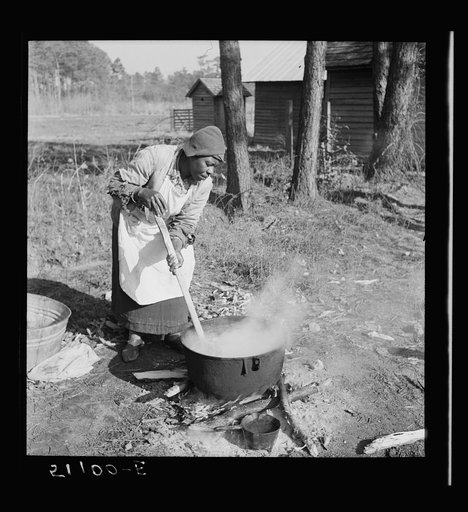 Untitled photo, possibly related to: Rendering lard. Maxton, North Carolina