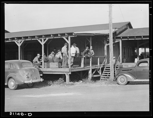 Waiting around the packing house for work. Belle Glade, Florida
