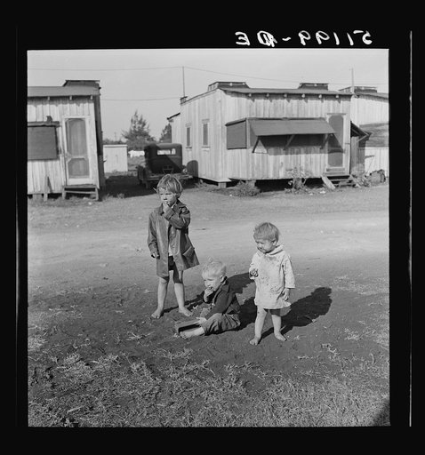 Migrant laborers children living in overcrowded camps with very bad sanitary conditions. Belle Glade, Florida