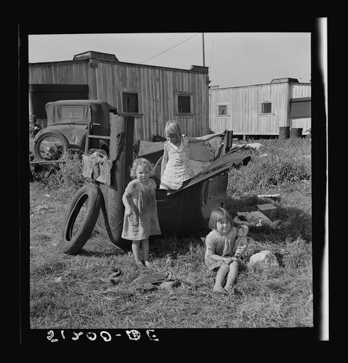 Migrant laborers children living in overcrowded camps with very bad sanitary conditions. Belle Glade, Florida