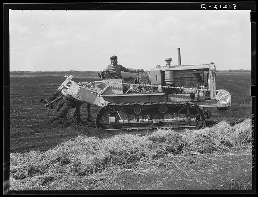 A whirling plough used by USSC (United States Sugar Corporation) in soft muck soil to prepare soil for planting sugarcane. Near Pahokee, Florida