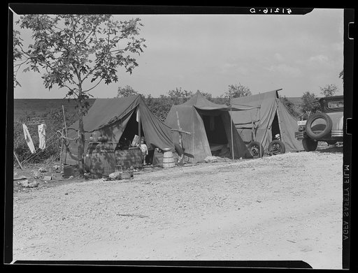 Migrant laborer's camp near packinghouse. Canal Point, Florida