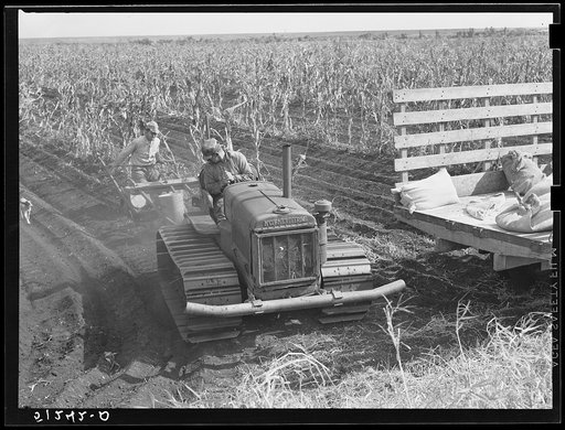Tractor-driven combination bean planter and fertilizer used on large tracts of farmlands around Lake Okeechobee, Florida