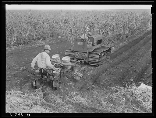 Tractor-driven combination bean planter and fertilizer used on large tracts of farmlands around Lake Okeechobee and Clewiston, Florida