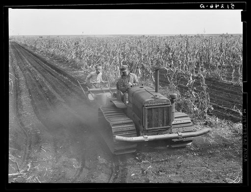 Tractor-driven combination bean planter and fertilizer used on large tracts of farmlands around Lake Okeechobee and Clewiston, Florida