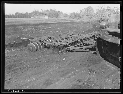 Untitled photo, possibly related to: Tractor-driven combination bean planter and fertilizer used on large tracts of farmlands around Lake Okeechobee, Florida