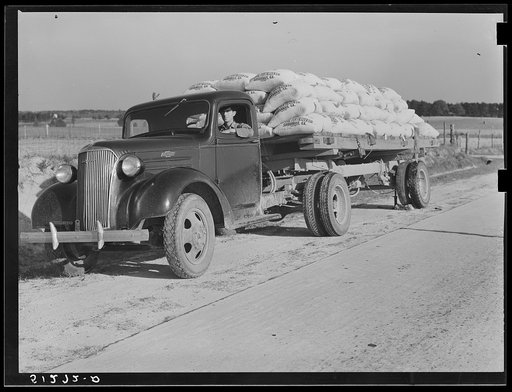 Truckload with fertilizer along highway. Greene County, Georgia